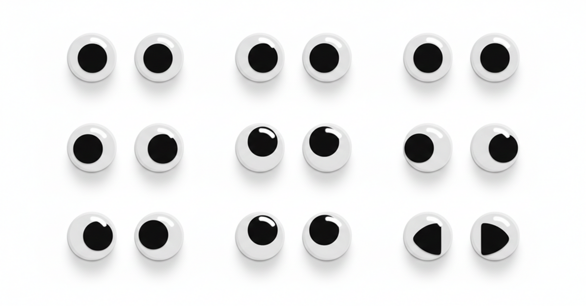 18 assorted black and white googly eyes with varying pupil positions and shine effects, self-adhesive craft eyes arranged in rows