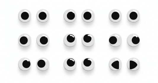 18 assorted black and white googly eyes with varying pupil positions and shine effects, self-adhesive craft eyes arranged in rows