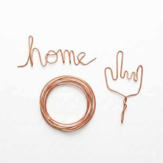 Copper art wire set featuring 'home' text, decorative fork design, and coiled circular wire on white background