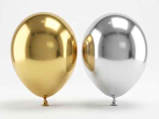 Two metallic balloons—one gold and one silver—with reflective mirror finishes displayed against a light background.