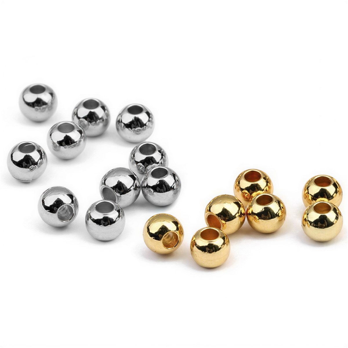 Silver and gold polished metal spacer beads with center holes arranged in two groups