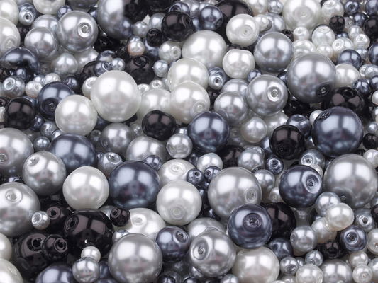 Collection of small pearl-finish beads in white, silver, gray, and black with pre-drilled holes