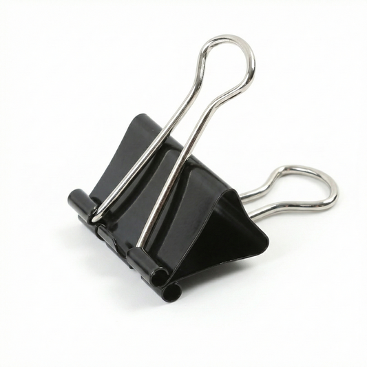 Black metal binder clip 25mm with silver-tone handles, viewed from above at an angle against white background