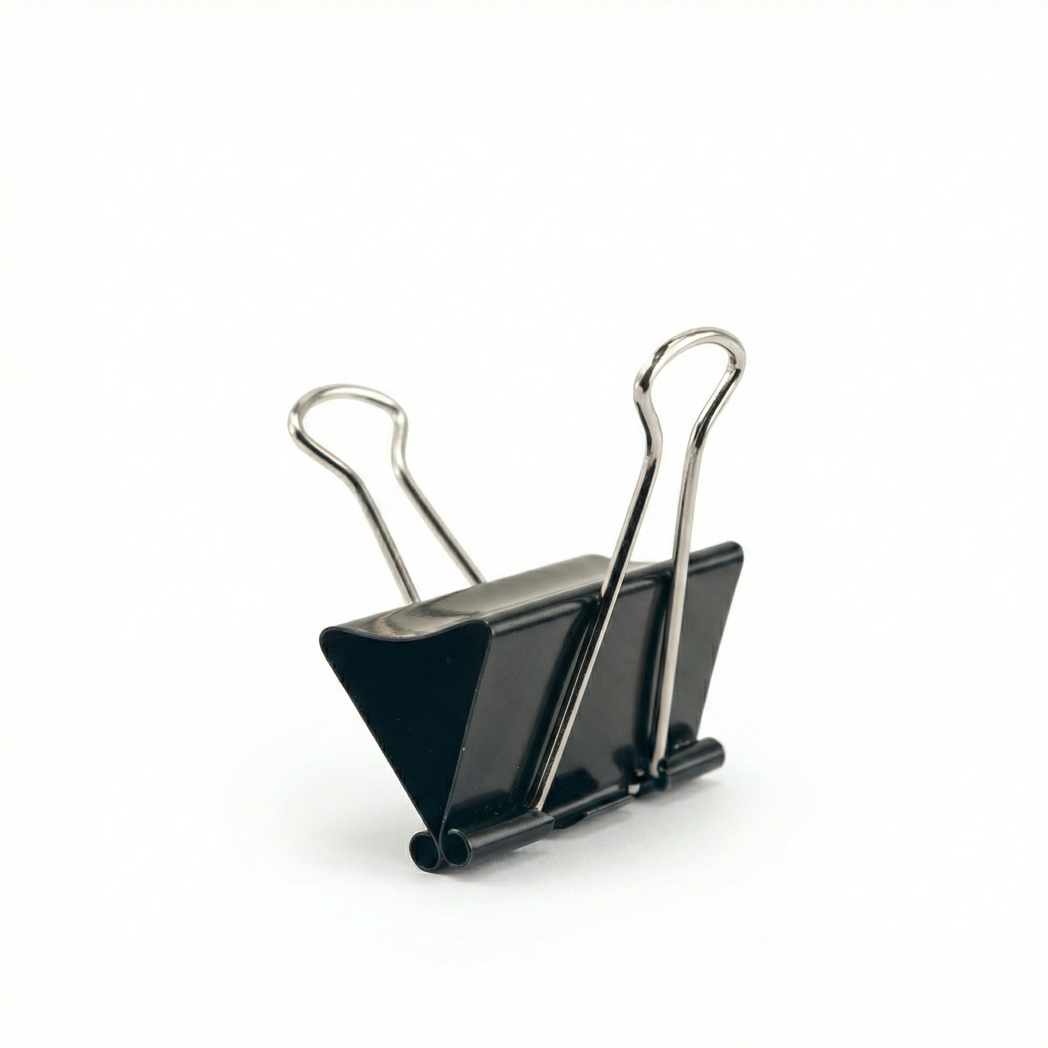 Black metal binder clip 41mm with silver wire handles on white background, professional office and studio stationery tool