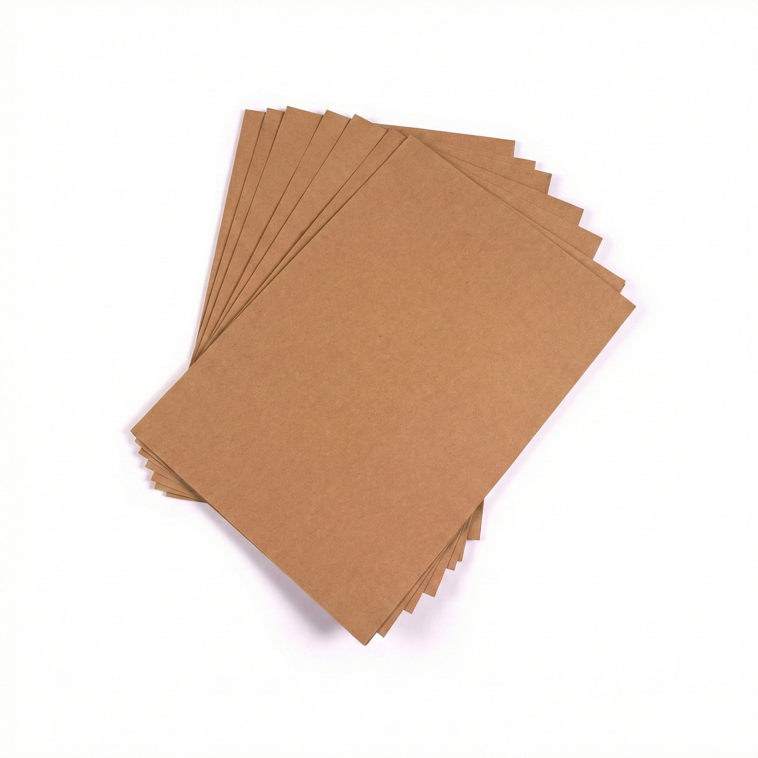 Stack of 10 brown kraft paper sheets in A4 size, fanned display on white background showing paper texture and thickness