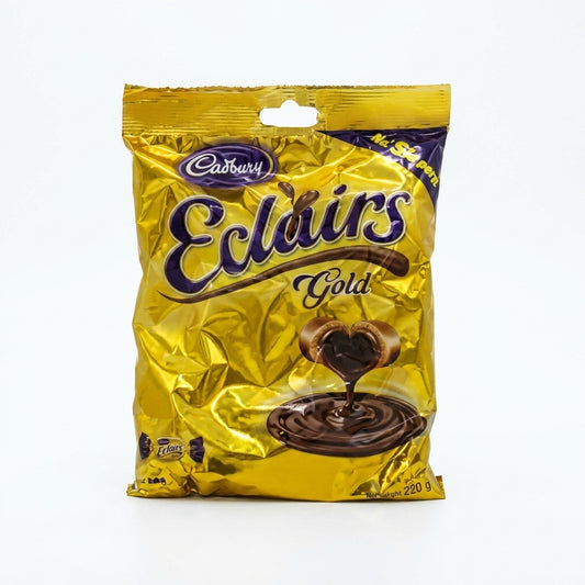 Cadbury Eclairs Gold 220g pack in yellow and purple wrapper with chocolate imagery