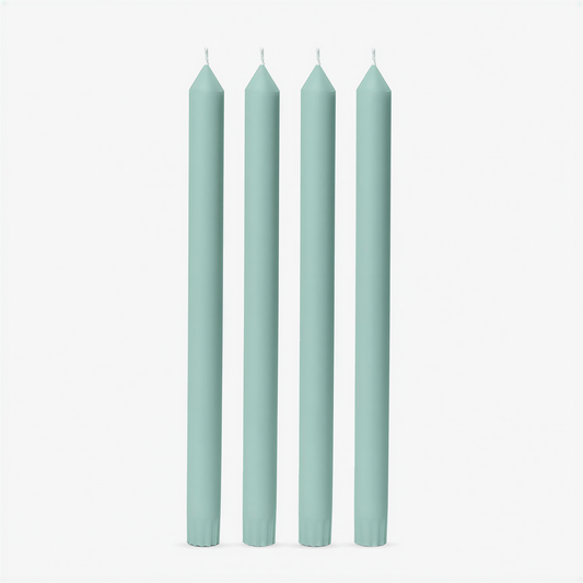Set of 4 teal taper candles with pointed tips arranged in a row against white background