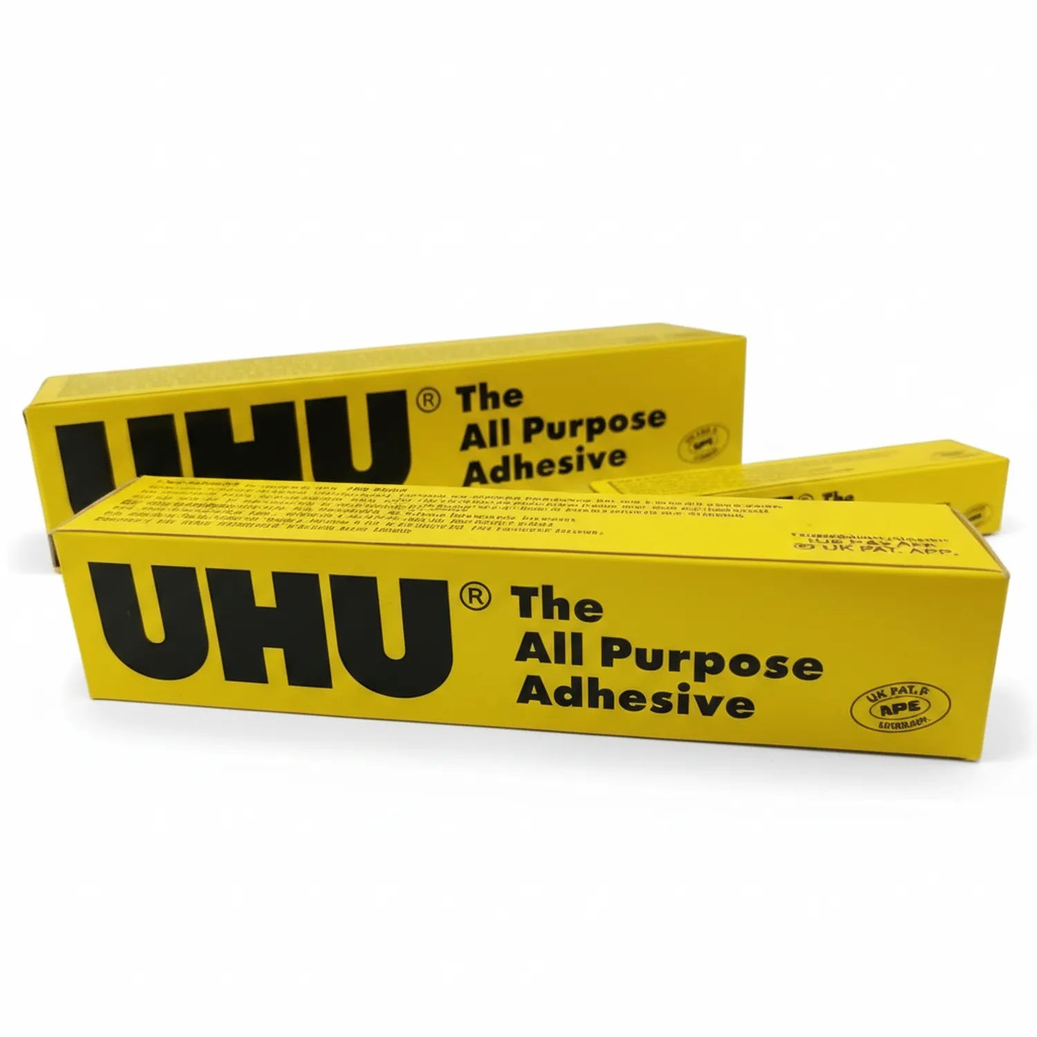 UHU All Purpose Adhesive glue tubes in iconic yellow packaging with black branding, showing product name and versatile bonding capability for multiple surfaces.