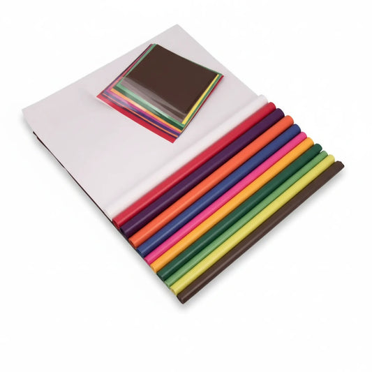 Kite Paper 16-color tissue paper collection displayed in a white box showing rainbow-colored rolled papers with sample swatches fanned out