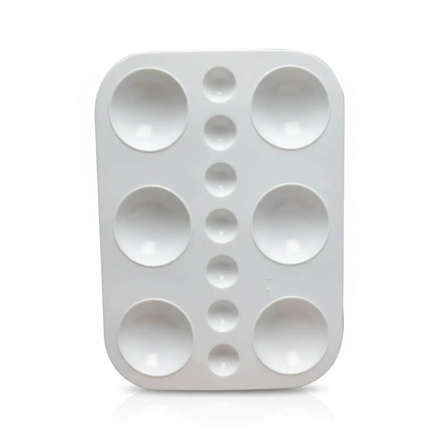 White ceramic Mixing Palette M with 6 large circular wells and 9 smaller wells arranged vertically down the center for artist paint mixing.