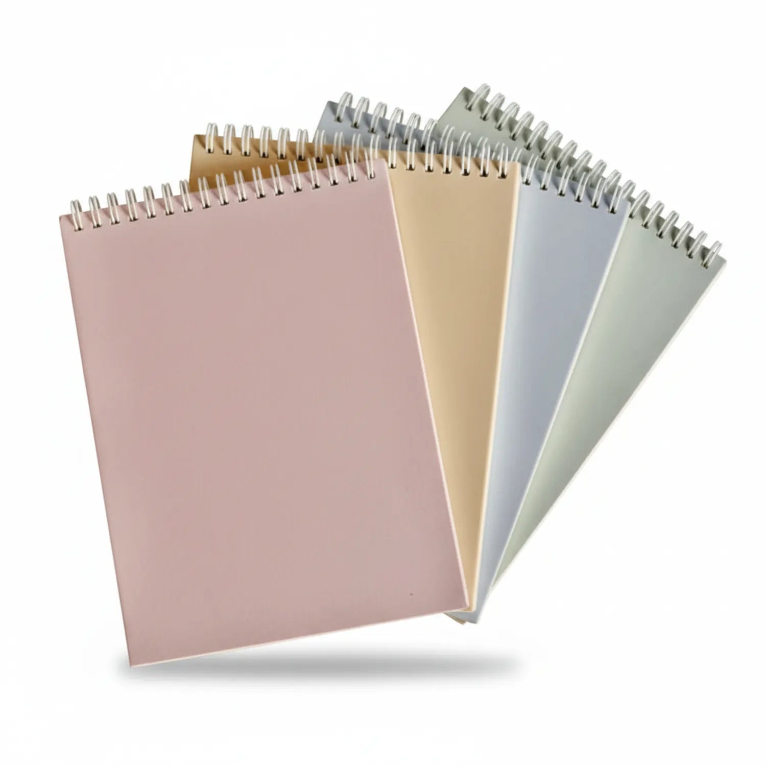 Four spiral-bound A5 note pads with 120 pages each, displayed in pastel pink, cream, blue, and sage green colors.