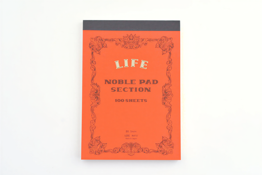 Life Noble Pad Section B6 100 sheets notepad with orange cover and decorative borders