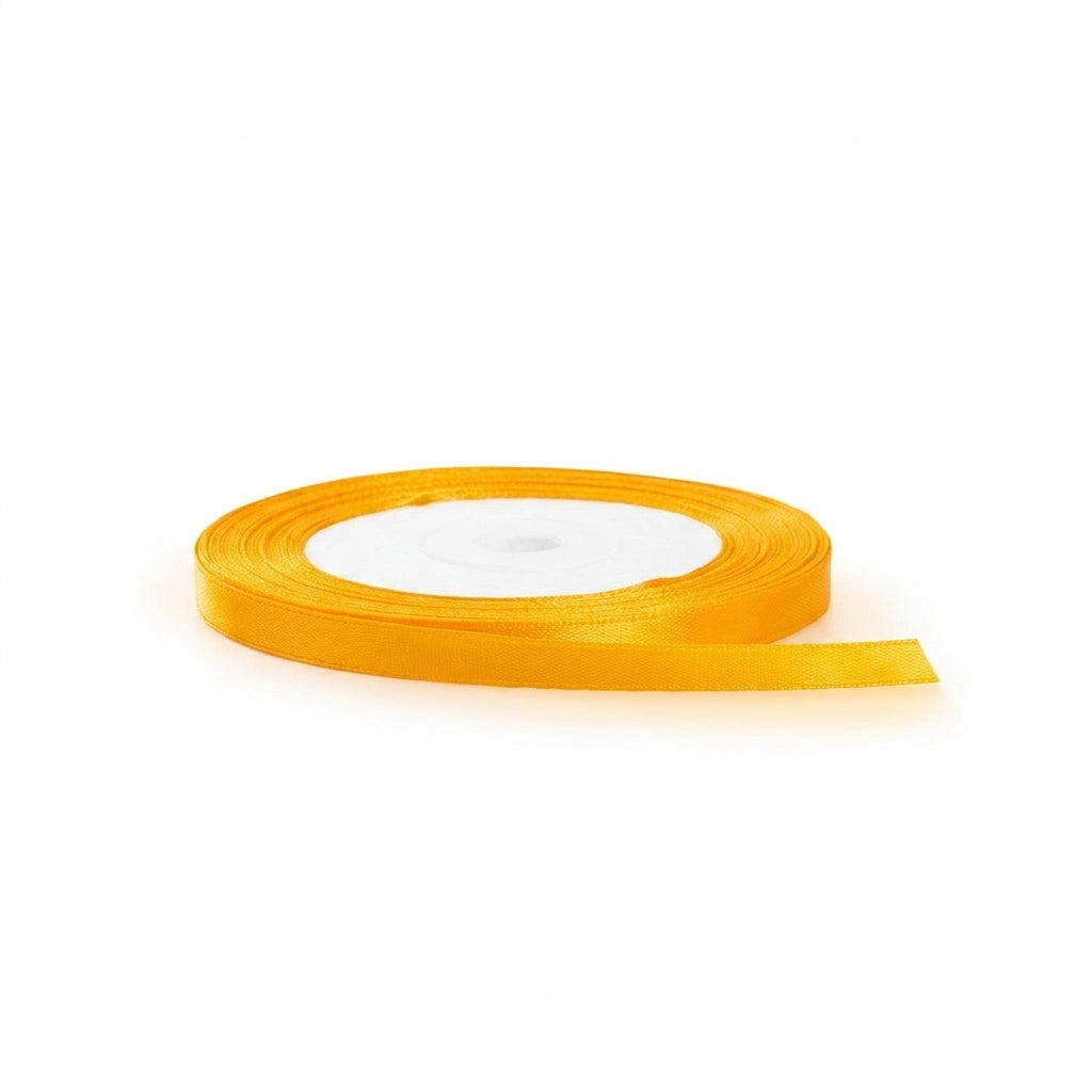 Gold satin ribbon half inch width on white spool with end unrolled