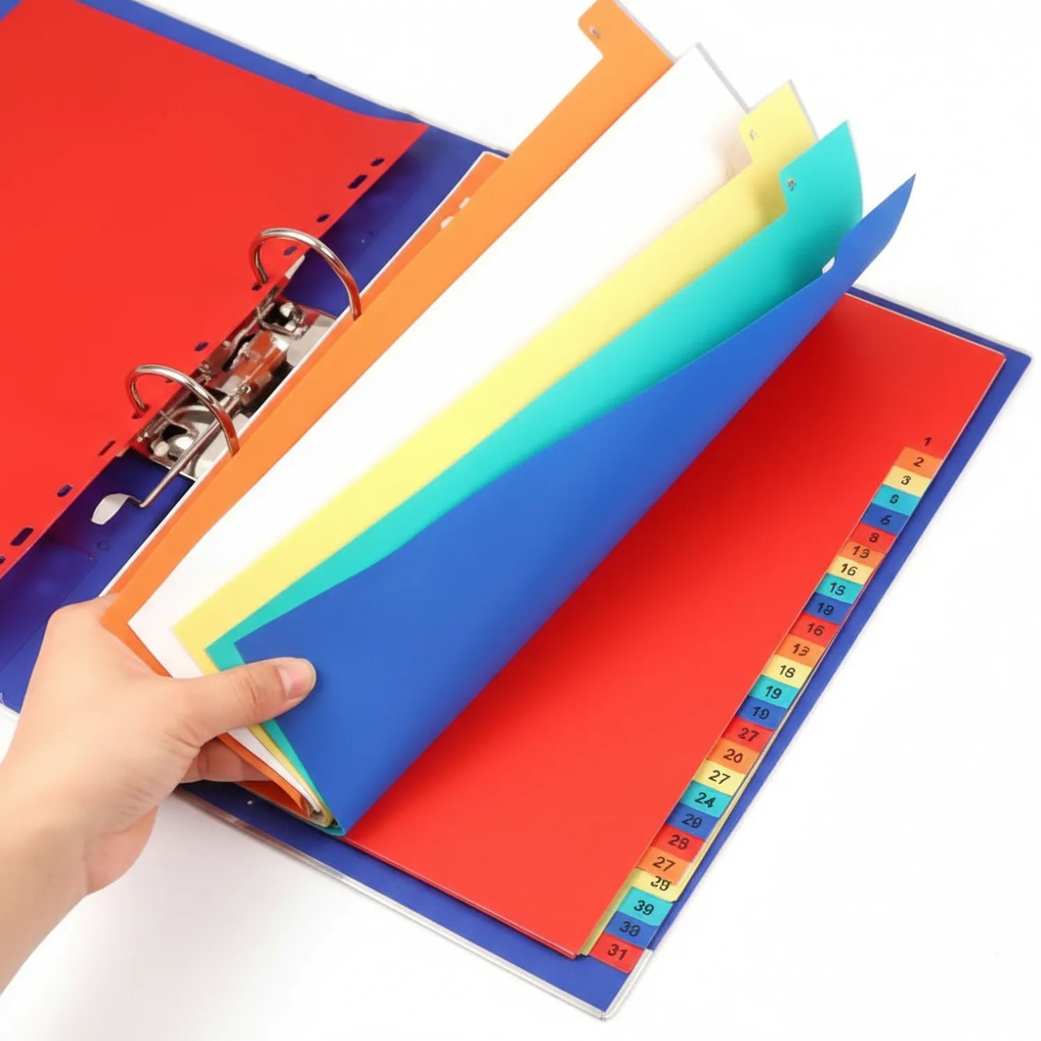 Hand holding colorful A4 plastic separator cards with 31 numbered color-coded tabs in red, blue, yellow, cyan, and orange with metal binder clips