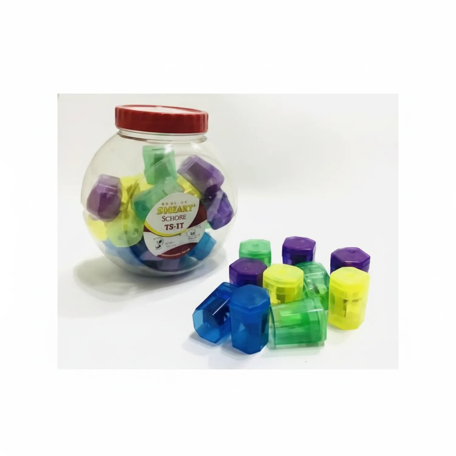 Smarty Sharpener Piano TS-1T set showing clear storage jar with red lid containing purple, green, yellow, and blue sharpeners, plus individual units displayed