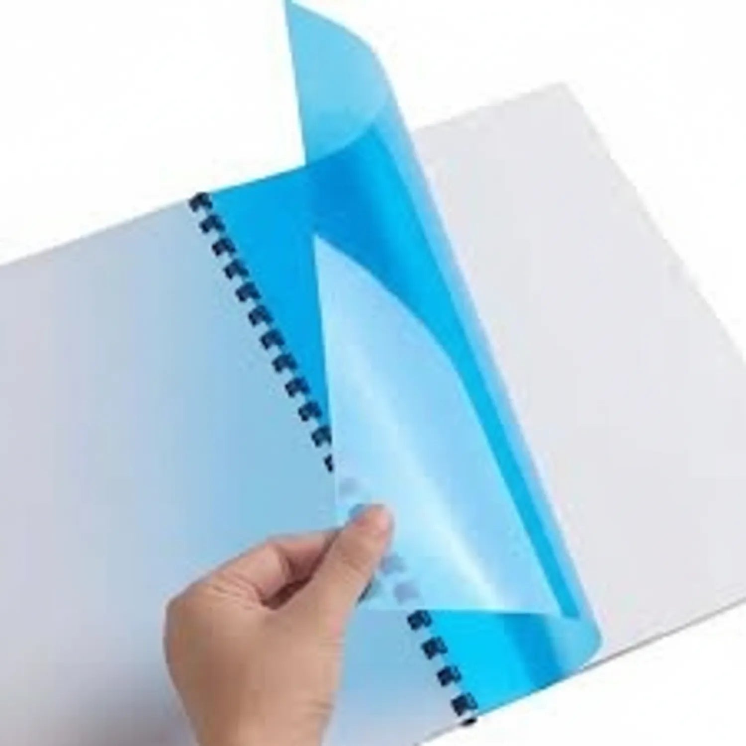 Blue transparent sheet binding cover with spiral binding holes, held in hand, showing clear protective plastic design for document organization