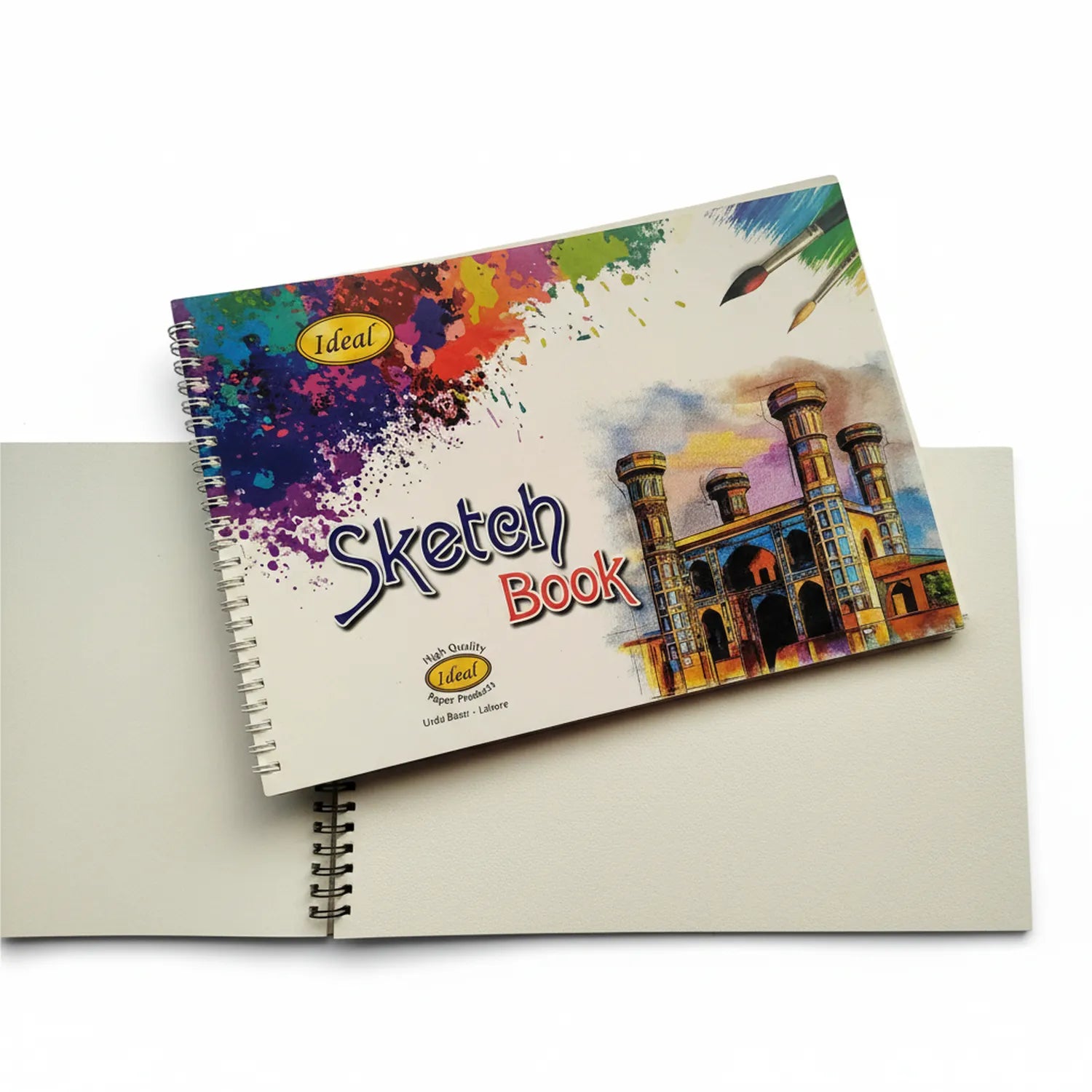Ideal Sketchbook 250G A4 spiral-bound sketch pad with colorful paint splash design on cover and architectural building illustration, shown with blank pages visible