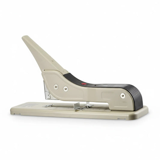 Fuji 2324 cream and black heavy-duty desktop stapler machine with metal base and ergonomic handle, shown from side angle.