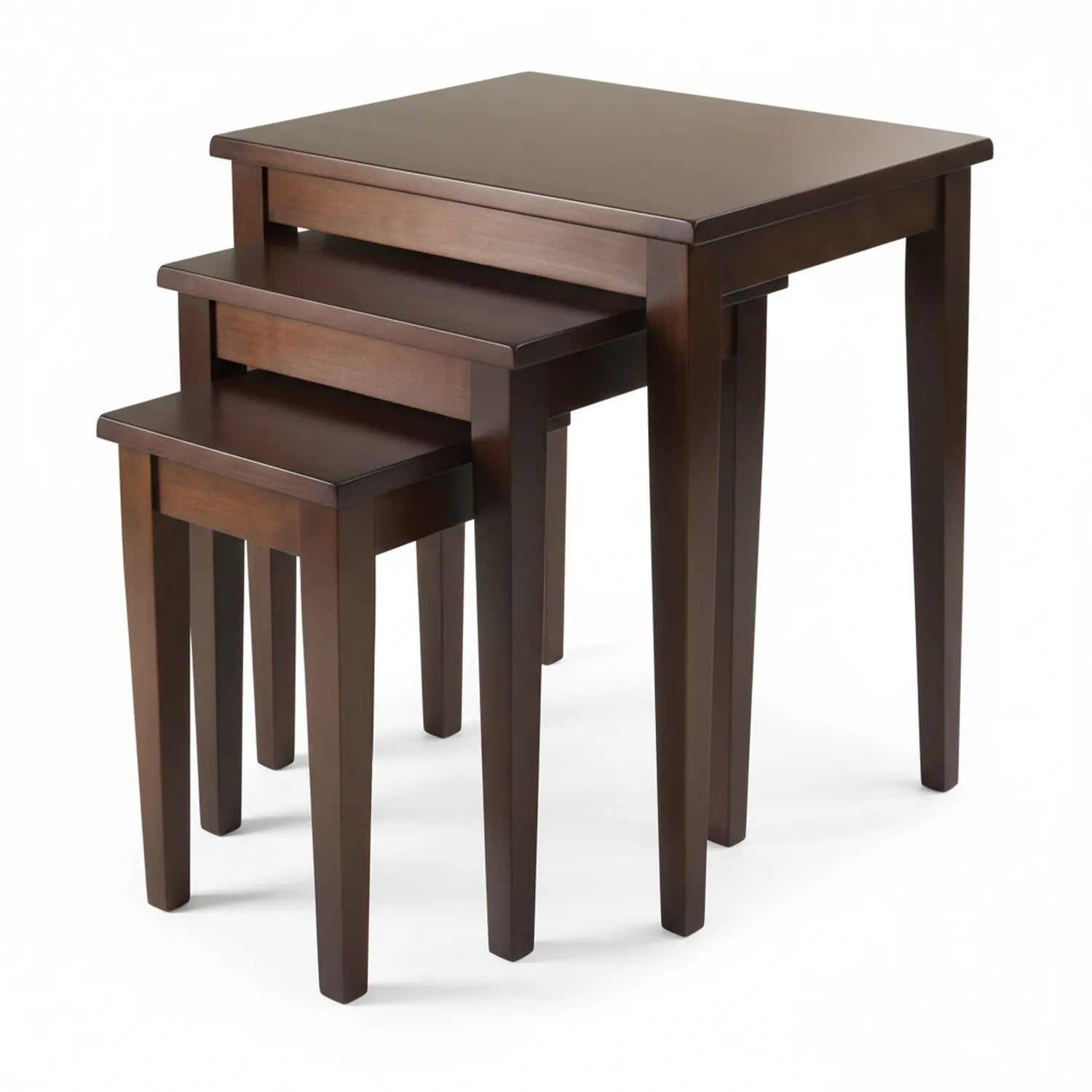 Three-piece dark walnut wood nesting table set arranged together, showing graduated sizes that nest into each other with sturdy legs