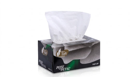 Rose Petal Ultra Soft Pop-Up tissue box with black and gray packaging, white tissues visible in dispenser opening